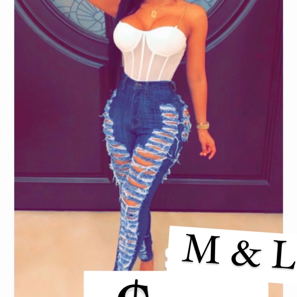 Rippy jeans ! BRAND NEW , the front and back are identical with rips